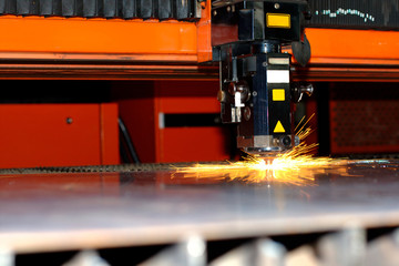 Industrial laser with sparks flying around