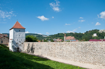 Fototapeta na wymiar Medieval defence stone wall and tower