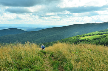 Senior tourist hiking in Bieszczady mountains, Poland
