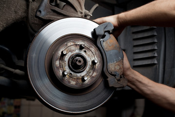 Car mechanic repair brake pads
