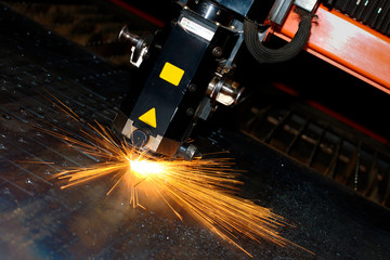 Industrial laser with sparks flying around