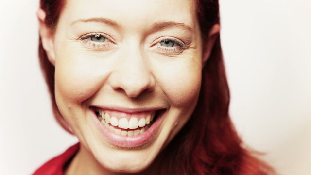 Happy smiling redhead girl