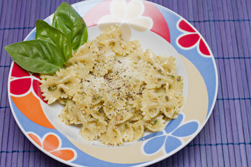 Pasta with Italian pesto sauce with basil