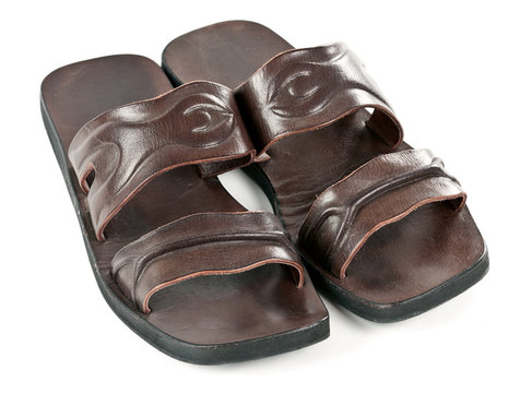 a pair of leather slippers for men