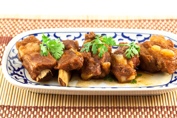Pork ribs with sweet sauce  on white background
