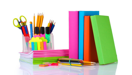 Fototapeta premium bright stationery and books isolated on white