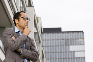 smart business man portrait in front of modern architecture