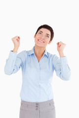 Happy businesswoman with the fists up