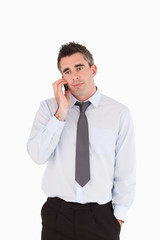 Fototapeta premium Portrait of a businessman making a phone call