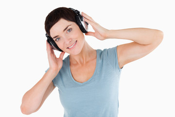 Fototapeta premium Close up of a woman listening to music