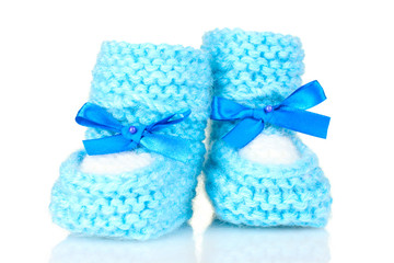 pink baby booties blue isolated on white