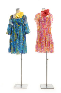 Two colorful dress on mannequin