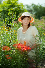 Happy  woman in  lily plant