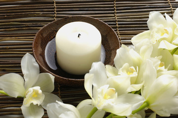 Spa background-white orchid and bowl of candle