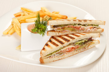 Sandwiches with French fried potatoes