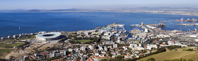 Fototapeta na wymiar Panorama of Cape Town’s waterfront, soccer stadium, and harbour