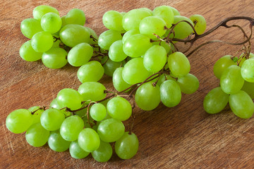 Fresh bunch of grapes on board