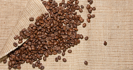 coffee beans on burlap background