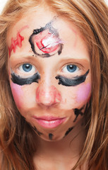 Young girl with painted face