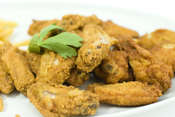 golden fried chicken in a white plate