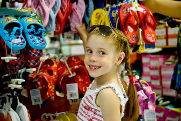 little girl in a shoe store