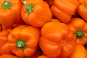 Orange peppers on display at the market