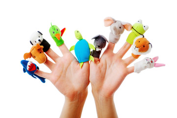 Female hands wearing 10 finger puppets