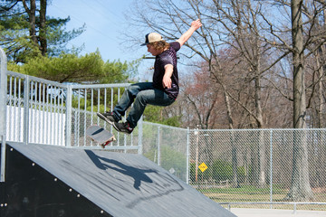 Skateboarder On a Skate Ramp