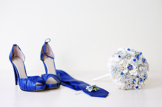 Blue Wedding Accessories On A White Background