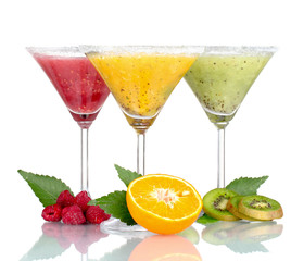 Delicious fruit smoothies and fruit isolated on white