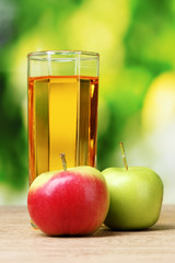 Healthy organic apple juice on table