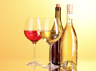 White wine on yellow background