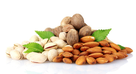 almonds, nutmeg, peanuts and pistachios isolated on white