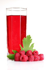 fresh raspberries, leaves and juice isolated on white