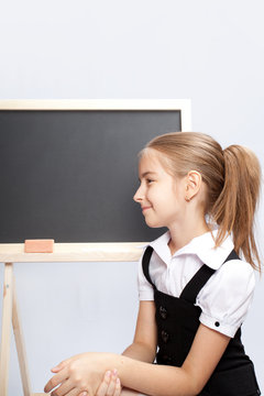 schoolgirl about a schoolboard