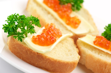 Canapes with salmon caviar
