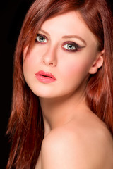 Fototapeta premium Portrait of beautiful red hair girl. Retouched