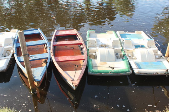 Anchored boats on a river