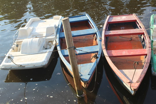 Anchored boats on a river