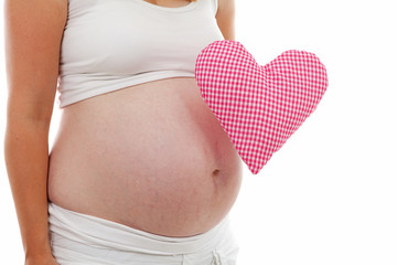 pregnant belly with checkered heart
