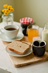 Breakfast with Toast, Coffee, Juice and Milk