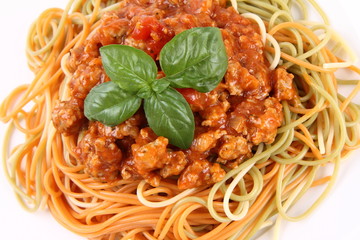Colorful Spaghetti bolognese on a plate