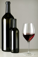 two bottles and wineglass