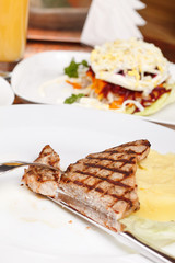 grilled steak with potatoes