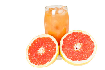 Beautiful image of a freshly cut grapefruit and a glass of juice