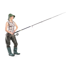 Smiling fisherwoman holding a fishing pole