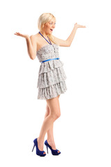 Surprised young woman with hands over her