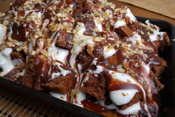 Pie filled in with chocolate and a cream