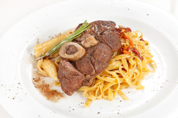 tasty steak with pasta