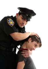 Police officer apprehending a teenage thief